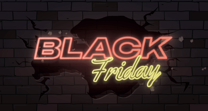 A glowing neon sign reading “Black Friday” on a dark brick wall, with the word “Black” in red and “Friday” in yellow script, representing a major retail sale event.